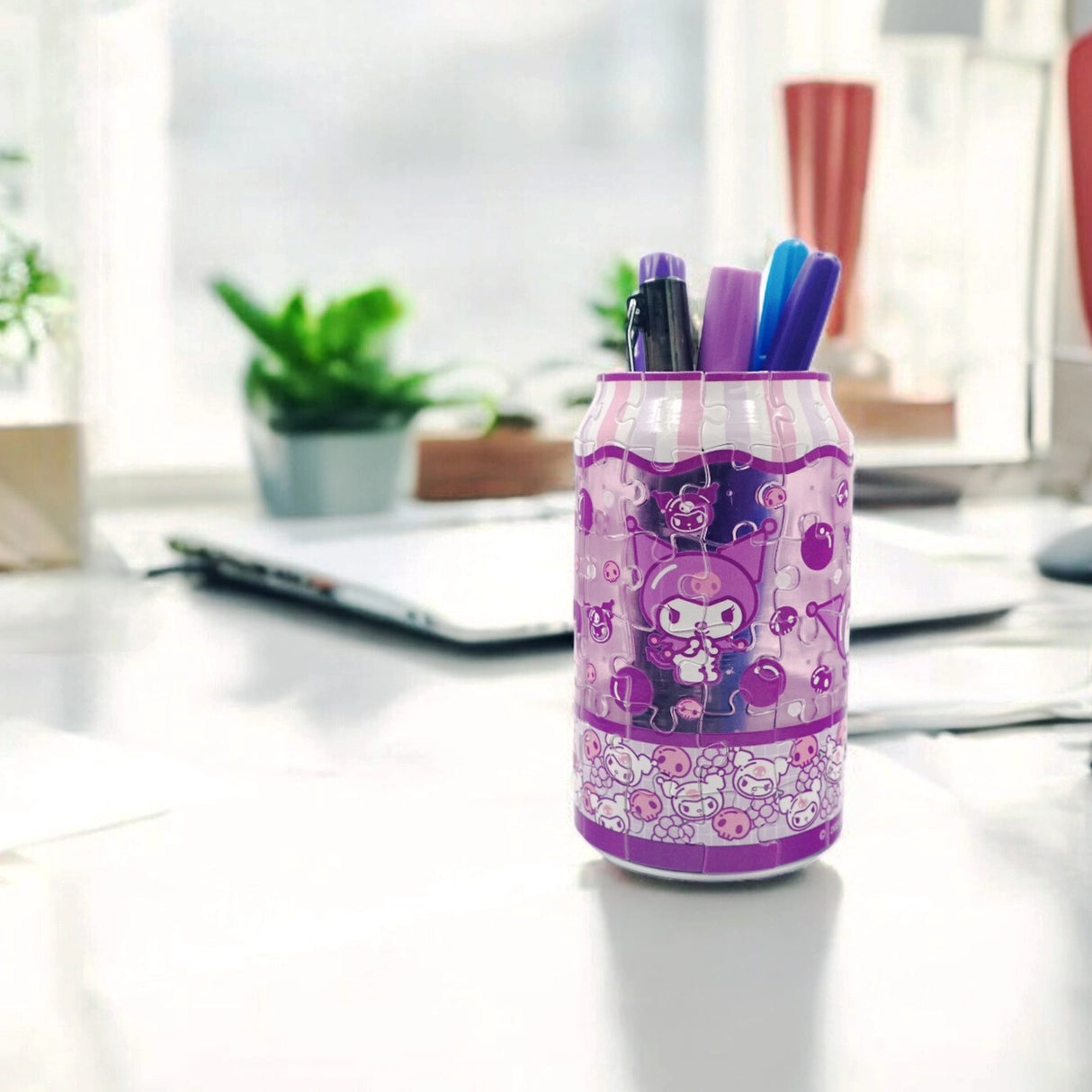 Create something truly unique with the Kuromi 3D Jigsaw Puzzle, designed in the shape of a fun and colorful soda can! This eye-catching puzzle features the mischievous and edgy Kuromi, complete with vibrant colors and bold details that make it an exciting challenge for puzzle lovers. Once you've assembled your soda can, it can be used to store small items, like office supplies, trinkets, or little collectibles. It also doubles as a quirky pencil holder.