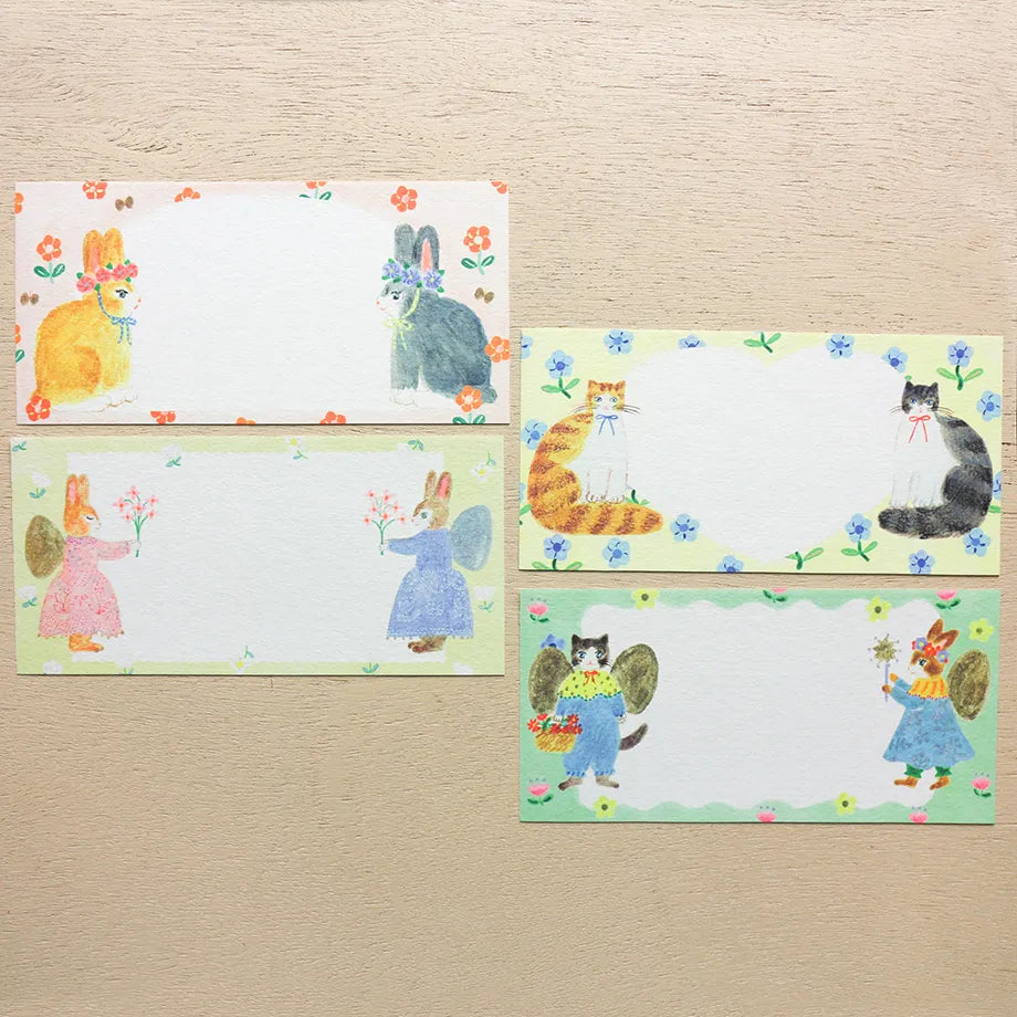 Illustration by Aiko Nukawa, featuring animals dressed in stylish clothes and cute flowers.
Since it uses fluorescent ink, the bright and vivid colors are adorable. Perfect for writing a small letter or thank-you note.
✨ Product Features
4 unique designs featuring whimsical animals and floral motifs
Perfect for short letters, thank‑you notes, or gift enclosures
Printed with fluorescent ink for vivid, eye‑catching color
Made with Mino washi, a traditional Japanese paper known for its soft texture and beaut