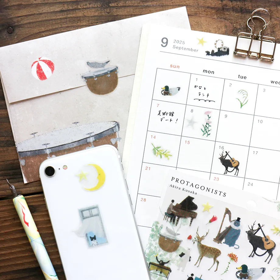 Stickers of illustrator Akira Kusaka. This sticker sheet is packed with beautiful drawings of animals playing instruments, perfect for any music lover.
Printed on PET material, the stickers have a smooth, durable finish that’s easy to peel and place - great for both everyday use and special projects.
✨ Product Details
Smooth, durable PET sticker material
Perfect for planners, journals, scrapbooking, and cardmaking
Backing Sheet Size: 141 × 188 mm
Sticker sheet size: 138 × 170 mm