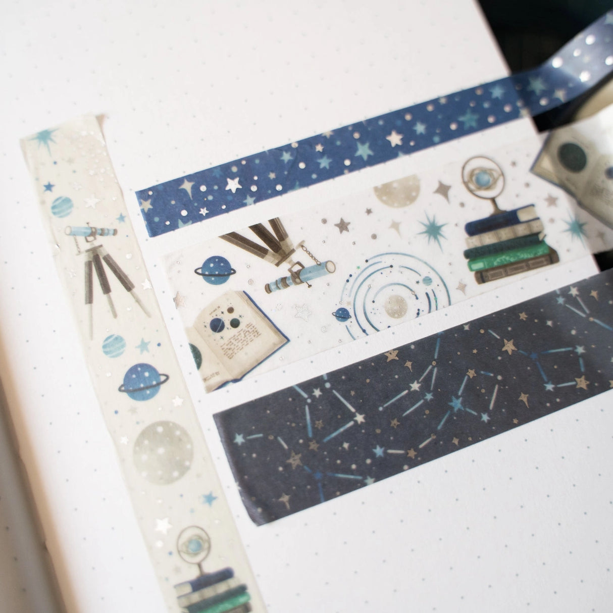 A dreamy celestial washi tape set inspired by stargazing, constellations, and drifting meteor trails. This coordinated collection features star-scattered skies, astronomy books, telescopes, planets, and deep midnight tones—perfect for adding a cosmic touch to planners and creative spreads.