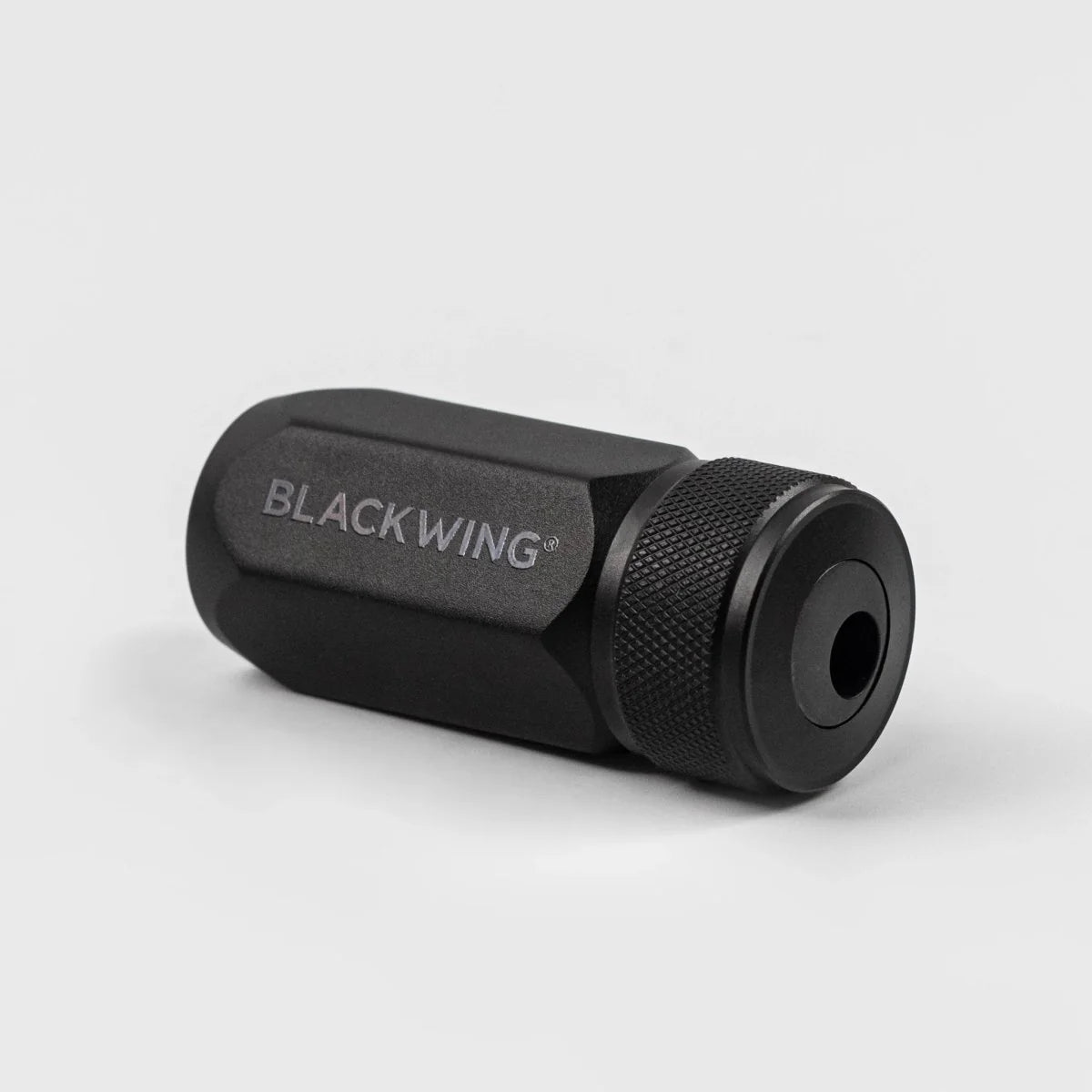 The Blackwing One-Step Long Point Sharpener creates a long, curved pencil point that resists breakage. Its convenient compact design is small enough to fit in the palm of your hand or as a permanent part of your everyday carry. This sharpener is available in black, grey, and white.