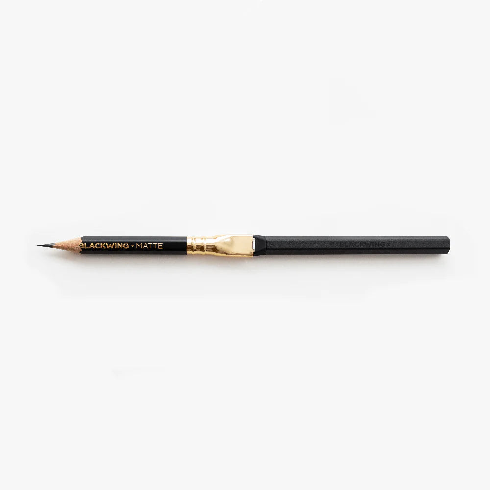 Breathe new life into those pencil nubs you've been saving and prolong the lifespan of your Blackwings with the Pencil Extender. The simple design allows the extender to slide into the clip of the existing Blackwing ferrule. The extender works with all Blackwing pencil models.
Each Blackwing Pencil Extender is made with machined aluminum and features a firm rubber tip to ensure a snug fit, making it feel like you’re holding a regular pencil.