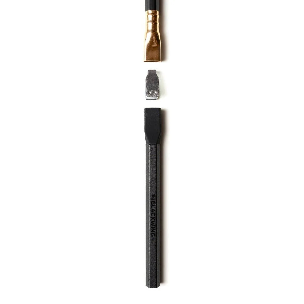 Breathe new life into those pencil nubs you've been saving and prolong the lifespan of your Blackwings with the Pencil Extender. The simple design allows the extender to slide into the clip of the existing Blackwing ferrule. The extender works with all Blackwing pencil models.
Each Blackwing Pencil Extender is made with machined aluminum and features a firm rubber tip to ensure a snug fit, making it feel like you’re holding a regular pencil.