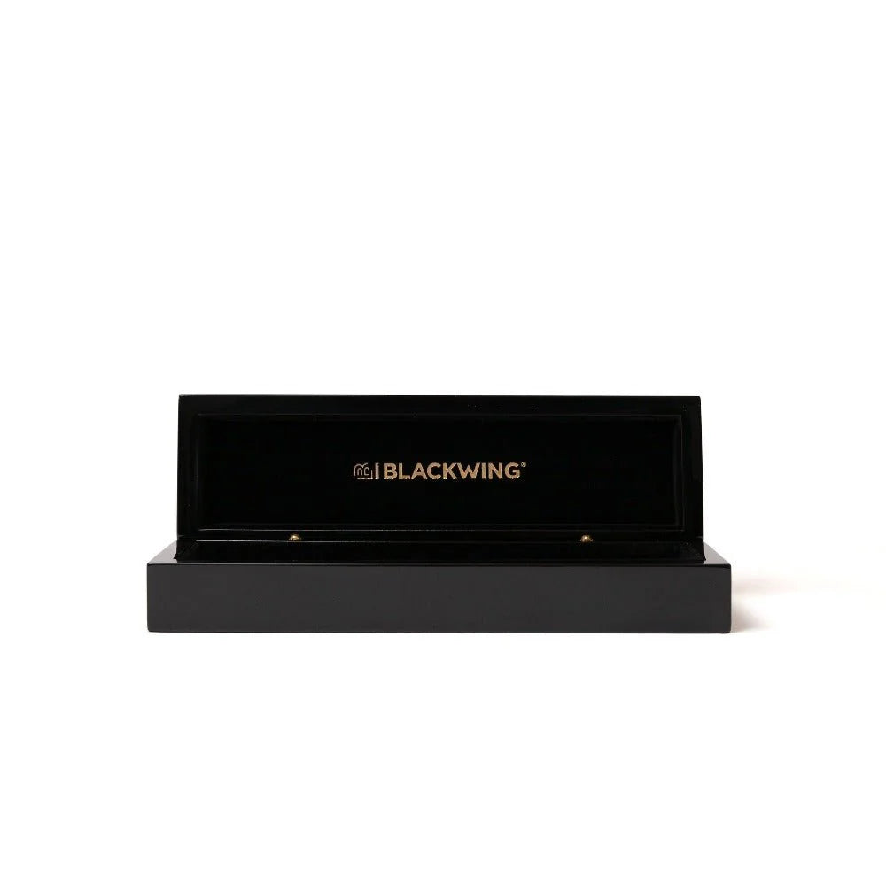 The Blackwing Piano Box is a beautiful addition to any desk or home office. This sleek and stylish gift set comes bundled with 12 of our iconic premium graphite pencils inside the box, available in Blackwing Matte, Blackwing 602, Blackwing Pearl, Blackwing Natural, or 3 of each. This pencil box is perfect for gifting or upgrading your workspace.
