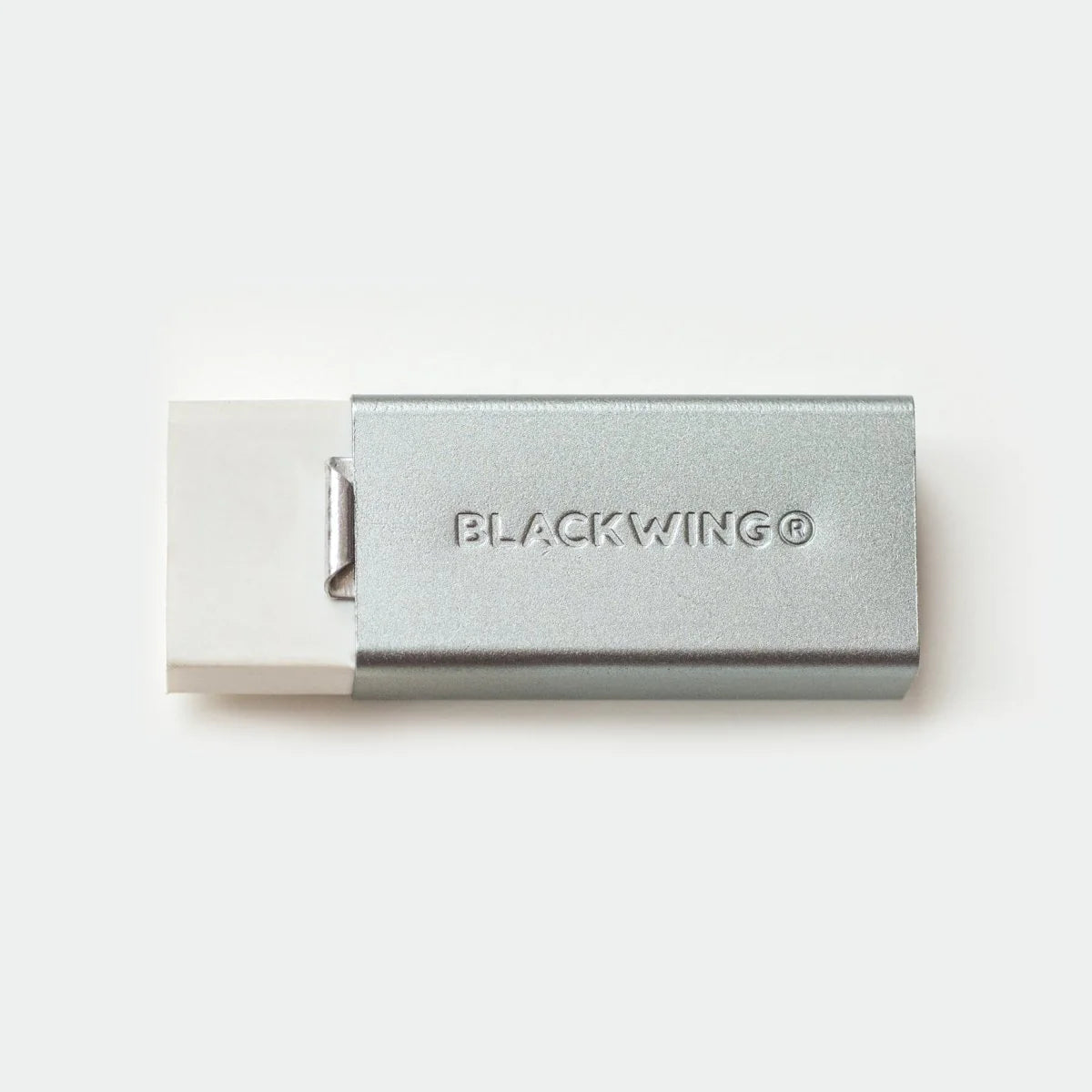 We took the iconic design of our eraser clip and adapted it into a sleek handheld form that feels great to use.
The eraser is made of a special soft material that erases the dark lines of our graphite cleanly and easily. The holder is made of durable aluminum that lets you get a solid grip while erasing. It also includes a jumbo-sized version of the iconic Blackwing clip, so you can extend the eraser as you use it.