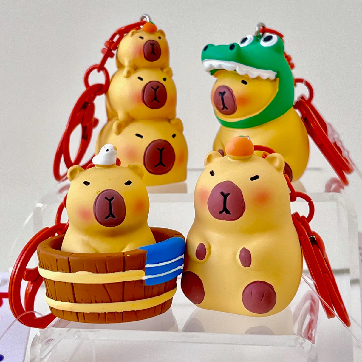 This adorable keychain adds personality wherever you go, whether clipped to your keys, bag, or backpack. Cute, lightweight, and easy to gift, it’s perfect for anyone who loves whimsical accessories or capybara-themed goodies.
Approx 2in x 2in
Includes 1 keychain 
