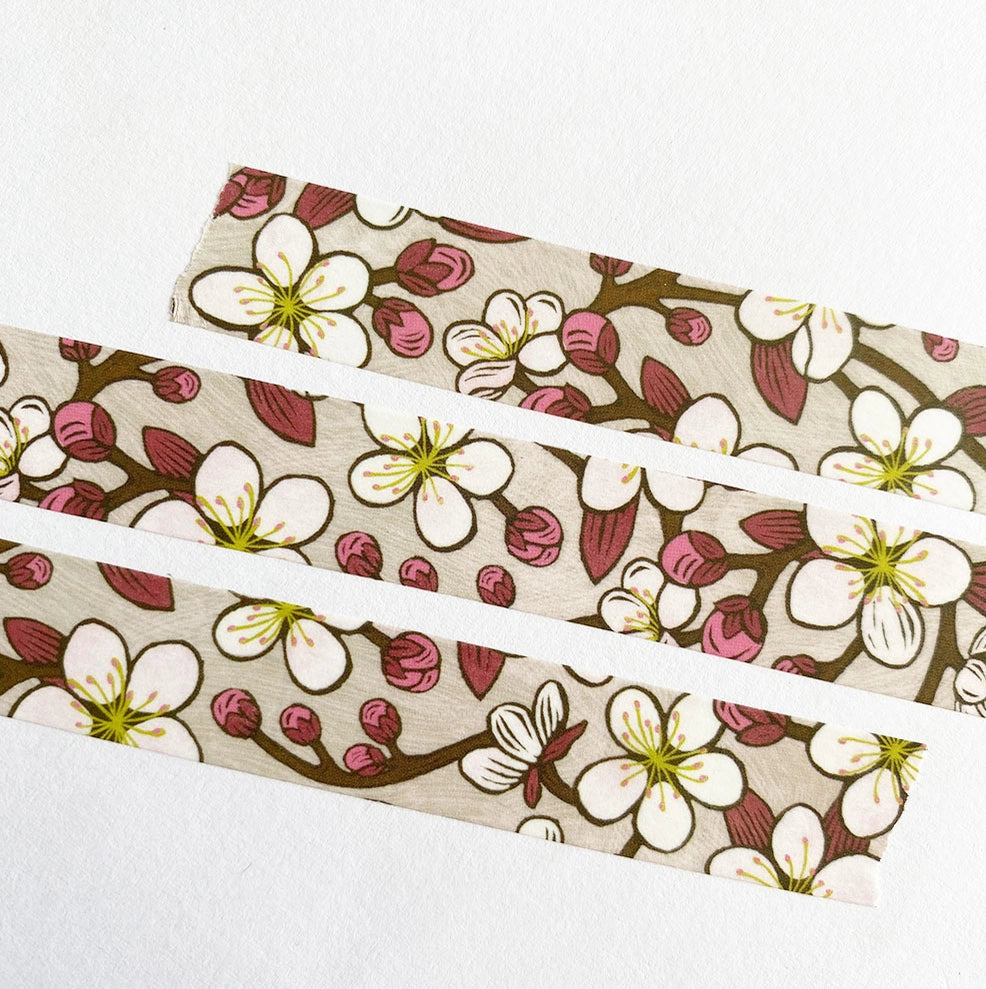 Our cherry blossom washi tape is a delicate pink tape created in celebration of our favorite early spring tree: the cherry blossom! This is a lightweight decorative tape printed on traditional rice paper. It is removable and leaves no residue, making it perfect for scrapbooking, stationery, crafts and more. Featuring a collection of complementary nature inspired designs that bring a pop of color to all your projects! Perfect for gifting and arts + crafts displays.
Tape dimensions: 15mm x 10m, or 0.59