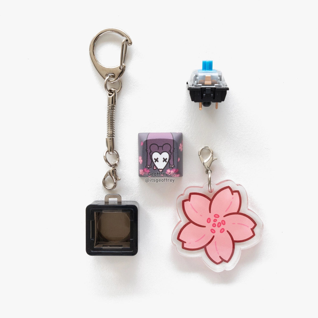 Dead 'Possom Clicky Keychain
Have you ever wanted to type on a keyboard without actually being productive? Then these are the keychains for you! The Blue Gateron switch was chosen specifically for the satisfying clicky sound and tactile feel of a mechanical keyboard. Each keychain also comes with a custom keycap and bonus tail charm.
Want a quieter switch or want to use your keycap for your keyboard? Keychains are packaged unassembled, so you can customize your keychain to your liking!
APPROX. SIZE: 
