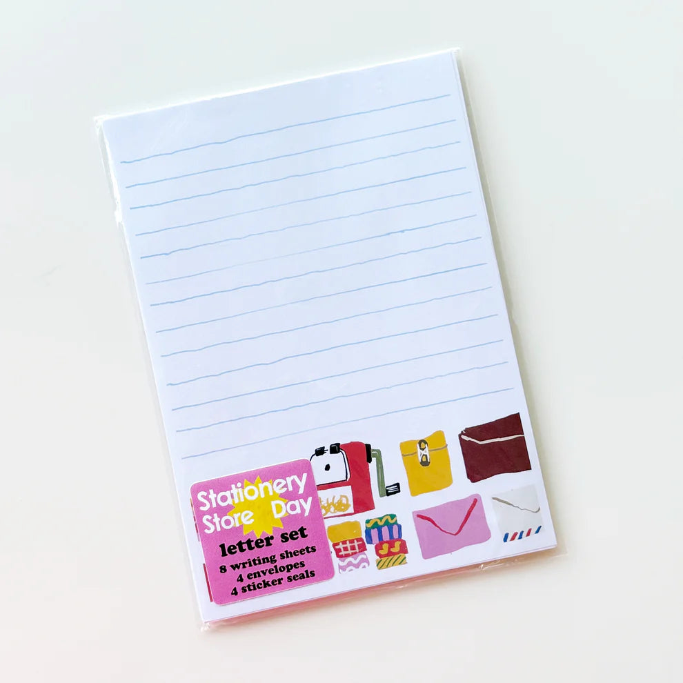 Letter writing set with a fun office supplies theme by Karen Schipper.
Set includes:
8 5.82" x 8.26" writing sheets
4 illustrated envelopes
4 sticker seals