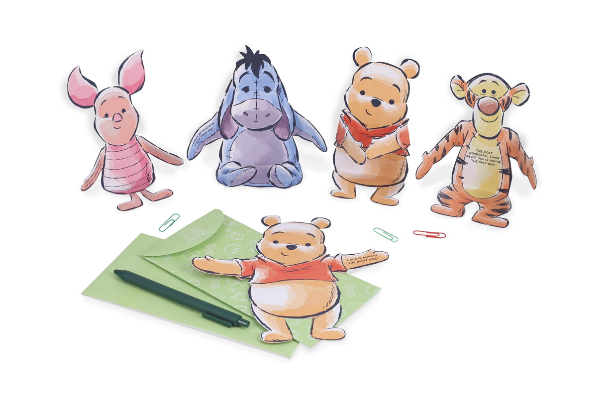 Send a sweet message with these hugging notecards inspired by characters from Disney’s Winnie the Pooh! With folded arms enclosing a short, sweet greeting, these charmingly illustrated cards are perfect for reminding the people you love that a hug is always the right size!
