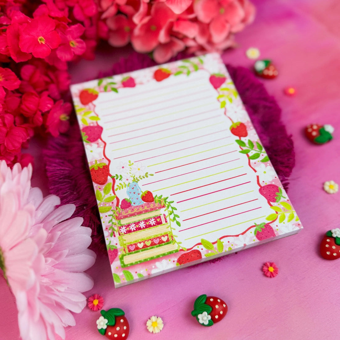 Stay organized in style with this adorable Strawberry Book Stack Notepad! Perfect for jotting down your daily tasks, goals, and bookish ideas, this notepads brings a pop of personality to your desk. Featuring a sturdy cardboard back and premium 70lb. uncoated paper, it's built to last through all your planning adventures.
✦ DETAILS ✦
Size: 4.25" x 5.5"
70 lb. Paper Uncoated
Padded With Cardboard Back
50 Sheets
No magnet backing