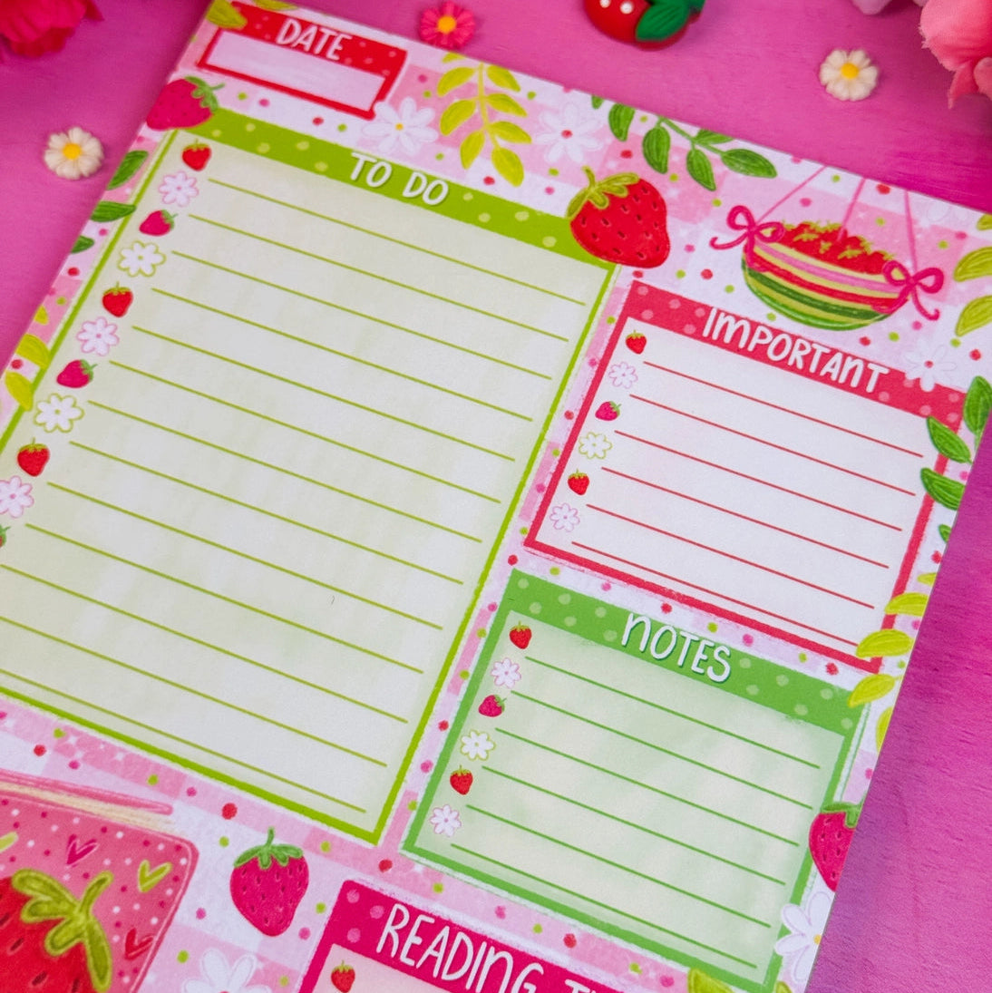 Stay organized in style with this adorable Strawberry Book Stack Daily Planner Notepad! Perfect for jotting down your daily tasks, goals, and bookish ideas, this notepads brings a pop of personality to your desk. Featuring a sturdy cardboard back and premium 70lb. uncoated paper, it's built to last through all your planning adventures.
✦ DETAILS ✦
Size: 5.5" x 8.5"
70 lb. Paper Uncoated
Padded With Cardboard Back
50 Sheets
No magnet backing