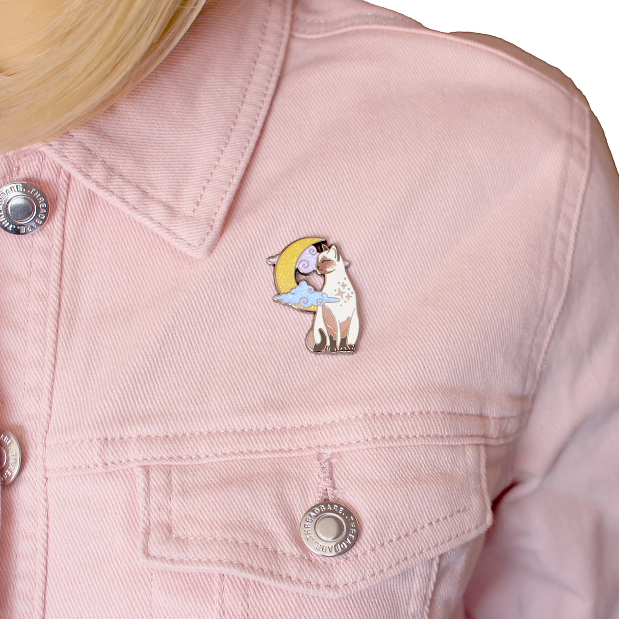 Glitter Punk - Pointed Cat Enamel Pin
Affectionate, clever and loud - there's no feline with the personality quite like a pointed cat!
This super sweet enamel pin depicts a pointed cat in a relaxed moment, in front of a glittery moon and clouds.