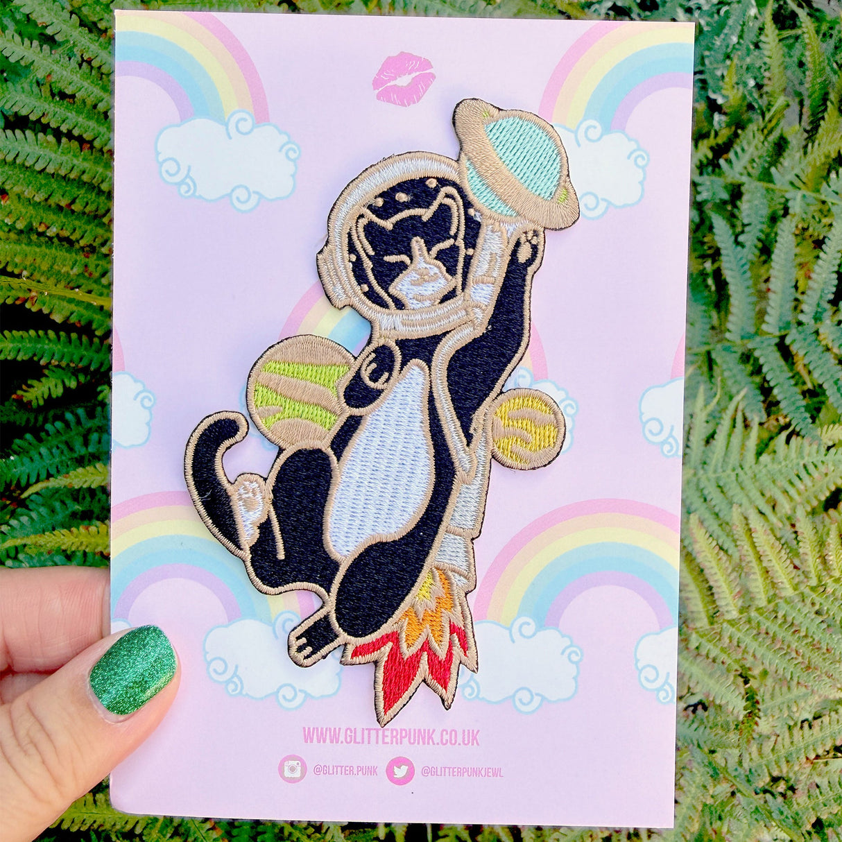 This awesome Astronaut Cat patch features a tuxedo cat with a helmet and rocket ship playing with some planets.
Beautifully woven with multi coloured threads, this fabulous patch with brighten up any coat, bag or hat!
Measurements: 64mm x 110mm