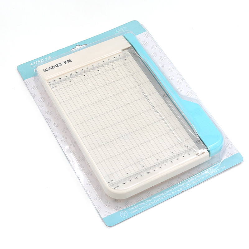 Built with a durable metal and plastic construction, this trimmer is perfect for craft rooms, classrooms, offices, and everyday projects. Its compact size makes it easy to store, while the sharp guillotine blade delivers smooth, straight cuts ideal for photos, cardstock, planner inserts, and more. Cleanly cuts 3 sheets of cardstock up to 9 inches.
Whether you're crafting, scrapbooking, or prepping materials for work, this cutter offers reliable performance in a convenient, easy‑to‑use design.