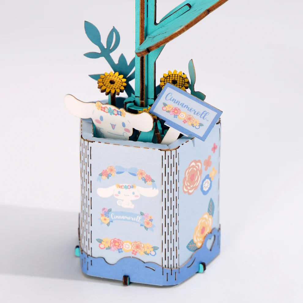 Bring your creativity to life with the Cinamoroll Sunflower 3D Wooden Puzzle Kit! This delightful DIY kit allows you to build a charming sunflower design featuring the beloved Cinamoroll character. Crafted from high-quality natural wood, the pieces fit together perfectly, offering a fun and rewarding challenge for both kids and adults.
The kit includes everything you need: step-by-step instructions and precisely cut wooden pieces that fit together without the need for glue or special tools.