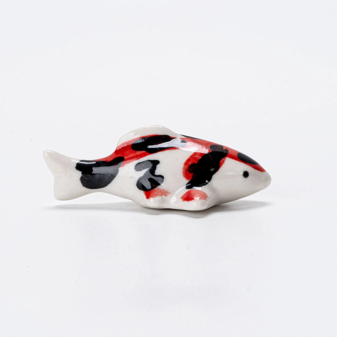 Porcelain Japanese Koi Fish chopstick rest / pen rest.