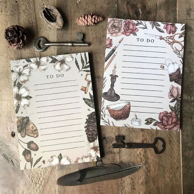 Whimsical, nature-inspired notepads perfect for writing your to do list, grocery list, and more. 50 pages, with full color illustration on the front of every page.
Matte finish perfect for writing.
Packaged in a clear cello sleeve.
Dimensions: 5.5"x4"