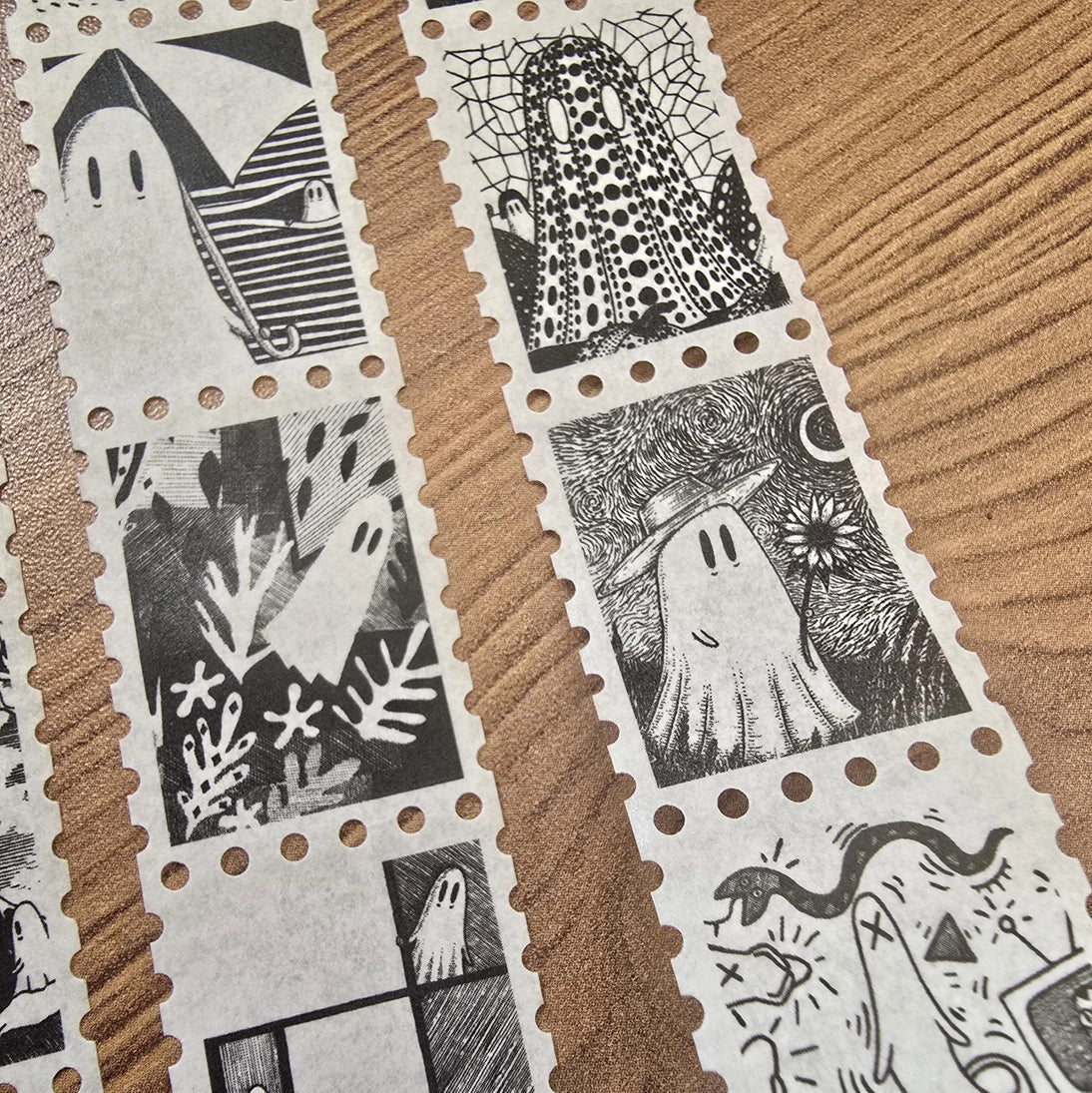 One of two tapes from the Creative Spirits series by Jon Turner, little ghosties taking you on an eclectic tour of art history. This roll features ghosts inspired by Vincent Van Gogh, Frida Kahlo, Piet Mondrian, Claude Monet, Henri Matisse, Hokusai, Malika Favre, Gustav Klimt, Keith Haring, and Yayoi Kusama.
Perforated to look like a roll of postage stamps, this washi tape features a repeating pattern of ten designs in portrait format from hand-drawn pen and ink artwork, recreated in incredible detail at m