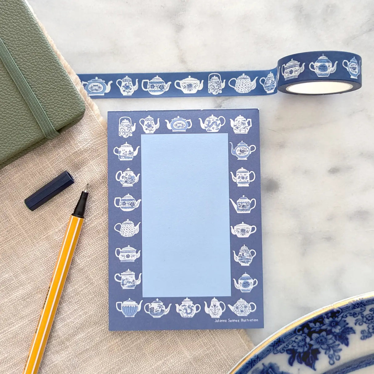 A simple tear away notepad for jotting down to do lists, things to remember, or a short Thank-You note. Illustrated with many different styles of blue and white teapots.