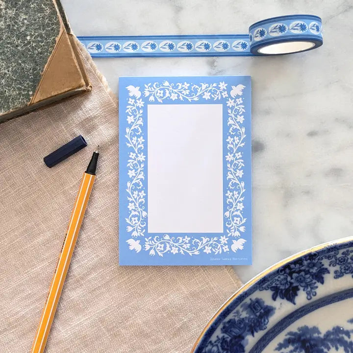 A simple tear away notepad for jotting down to do lists, things to remember, or a short Thank-You note. Illustrated with a pattern of birds, vines, and flowers.