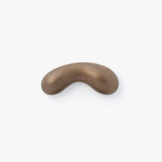 Our Hasami ware pen rests are inspired by the natural form of droplets. Four distinctive colours have been specially selected from an extensive variety of glazes. The soft contours gently guide and hold your pen in place.
Four colours were chosen to celebrate the unique richness of Hasami porcelain and glazes.
The golden glaze has an unassuming presence when raw. The unique and variable nature of pottery work is evident here with the finished colouring dictated by the position inside the kiln and revealed