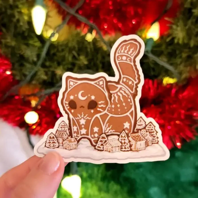 Katrina Wold Art - Tiny Cat Vinyl Sticker - Winter Gingerbread
Matte laminated vinyl sticker featuring a cute Yule cat with a little gingerbread village.
Matte laminated vinyl sticker
Waterproof, UV- and scratch-resistant
Features original, 100% hand-drawn art
Actual color may vary due to differences in lighting, device screen settings, etc.
