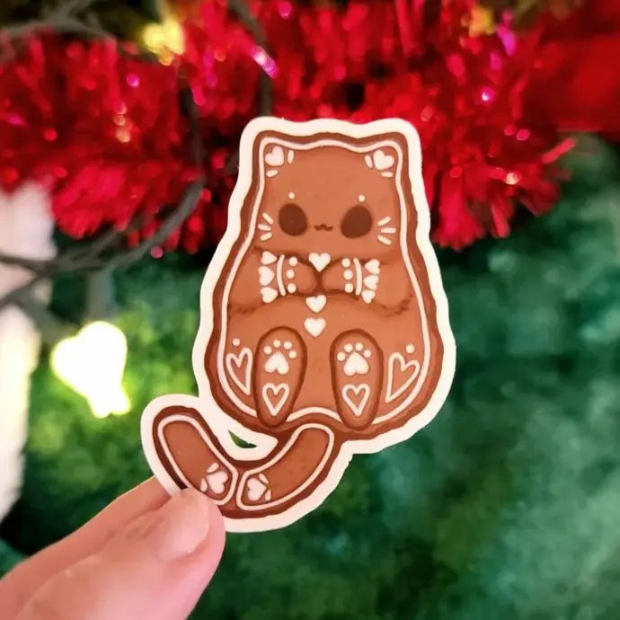 Katrina Wold Art - Tiny Cat Vinyl Sticker - Winter Gingerbread
Matte laminated vinyl sticker featuring a cute kitty gingerbread cookie.
Matte laminated vinyl sticker
Waterproof, UV- and scratch-resistant
Features original, 100% hand-drawn art
Actual color may vary due to differences in lighting, device screen settings, etc.