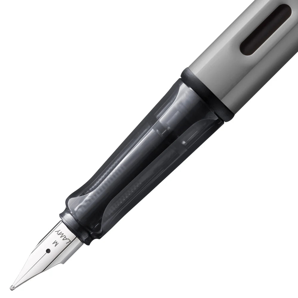 Light, lighter, LAMY AL-star: the writing classic made of resistant aluminium masters all challenges of everyday life in style. The transparent grip lies comfortably in the hand and, with an unobstructed view of the ink duct, turns the functional into a visual highlight. The series is ever inspiring with new special editions in current trendy colours and is thus an inspiring must-have in any pencil case.
Lightweight fountain pen with polished steel nib and ergonomic grip made of high-quality transparent pl
