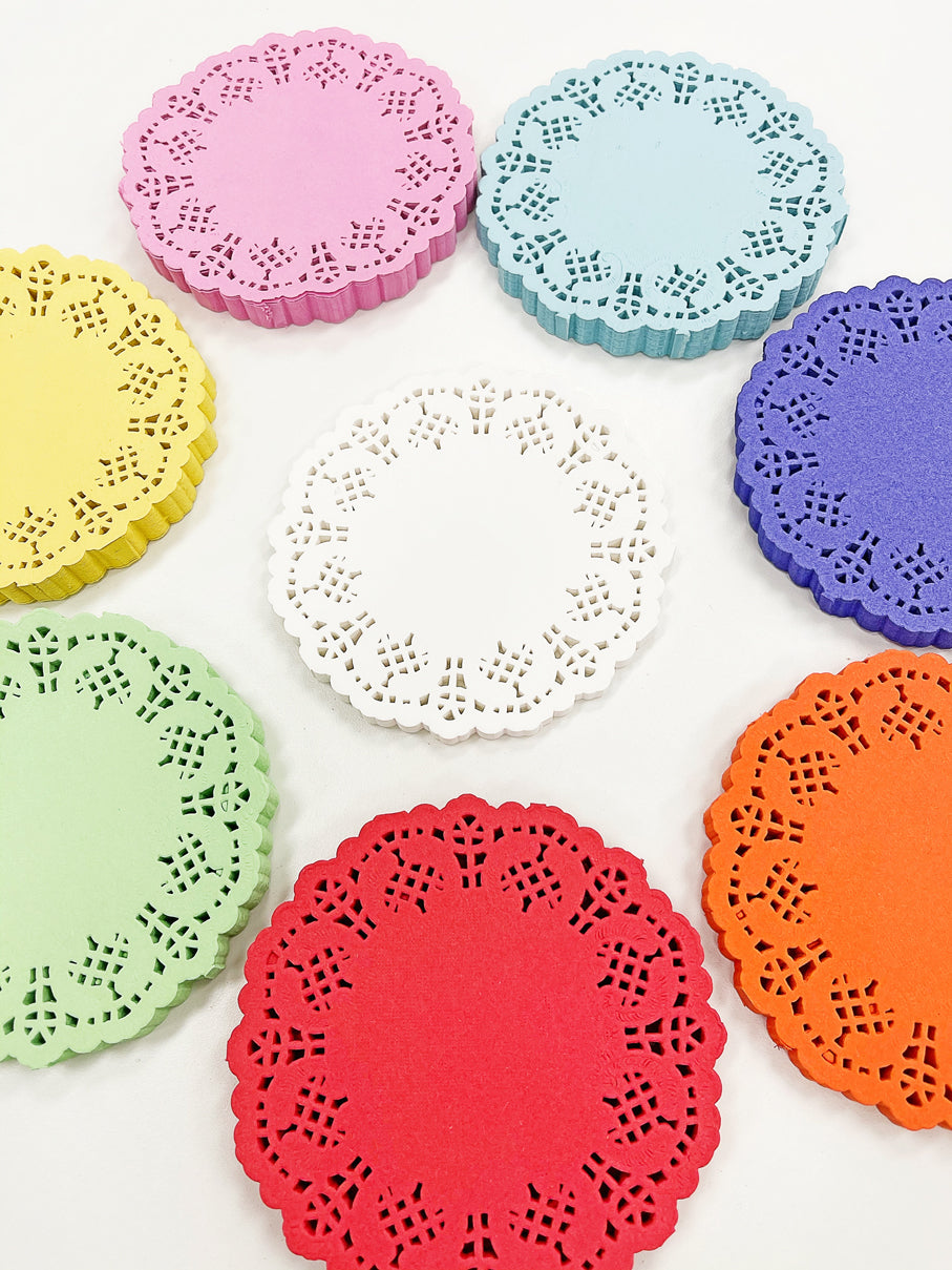 Doilies de jugo de naranja de 4,5" 100 unidades
