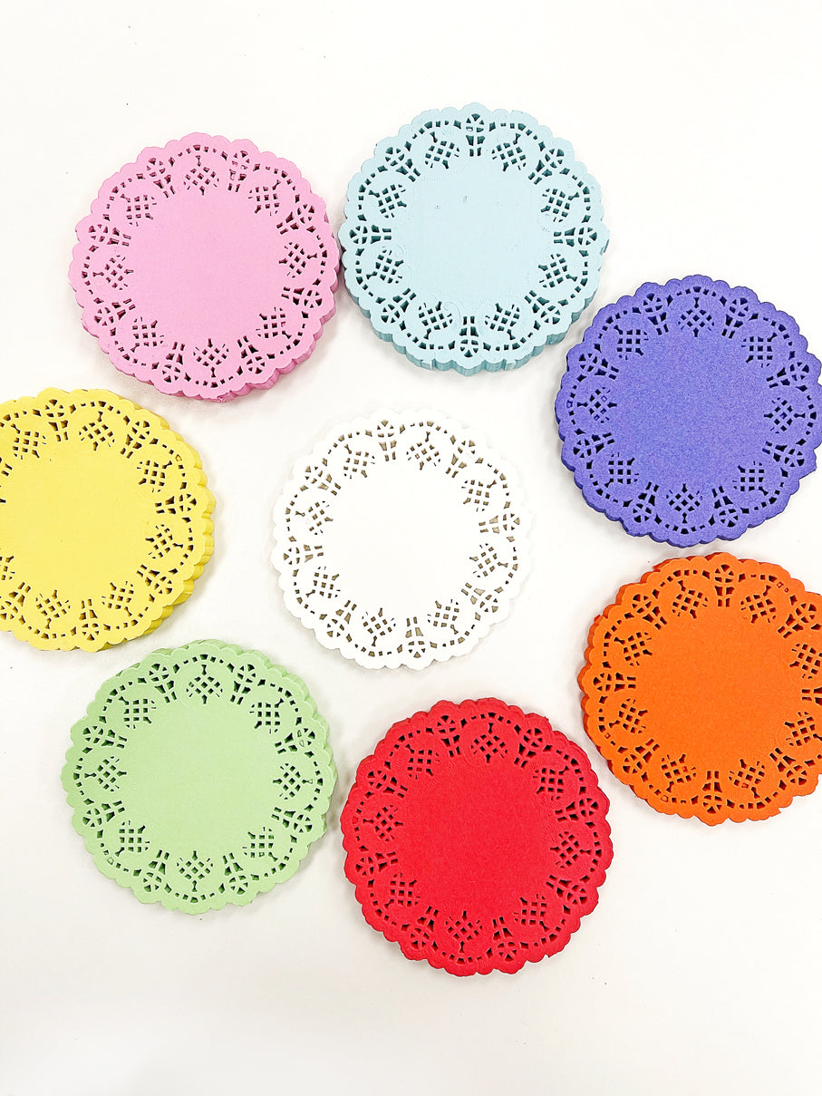 Doilies de jugo de naranja de 4,5" 100 unidades