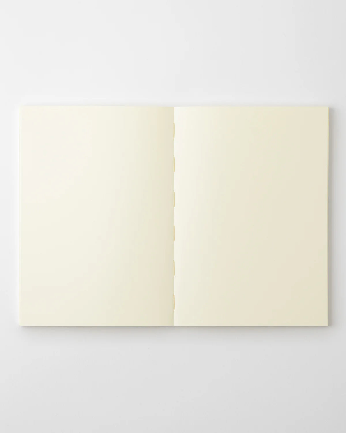 Crafted in Japan, this minimalist notebook is designed to enhance your writing experience. Inside, you'll find the high-quality Midori Diary (MD) paper, first developed in 1960 and refined ever since. Midori has rigorously tested this paper with various writing instruments to ensure quality, checking for ink feathering or bleeding, drying time, the smoothness of pen tips on the surface, and the tactile feel.