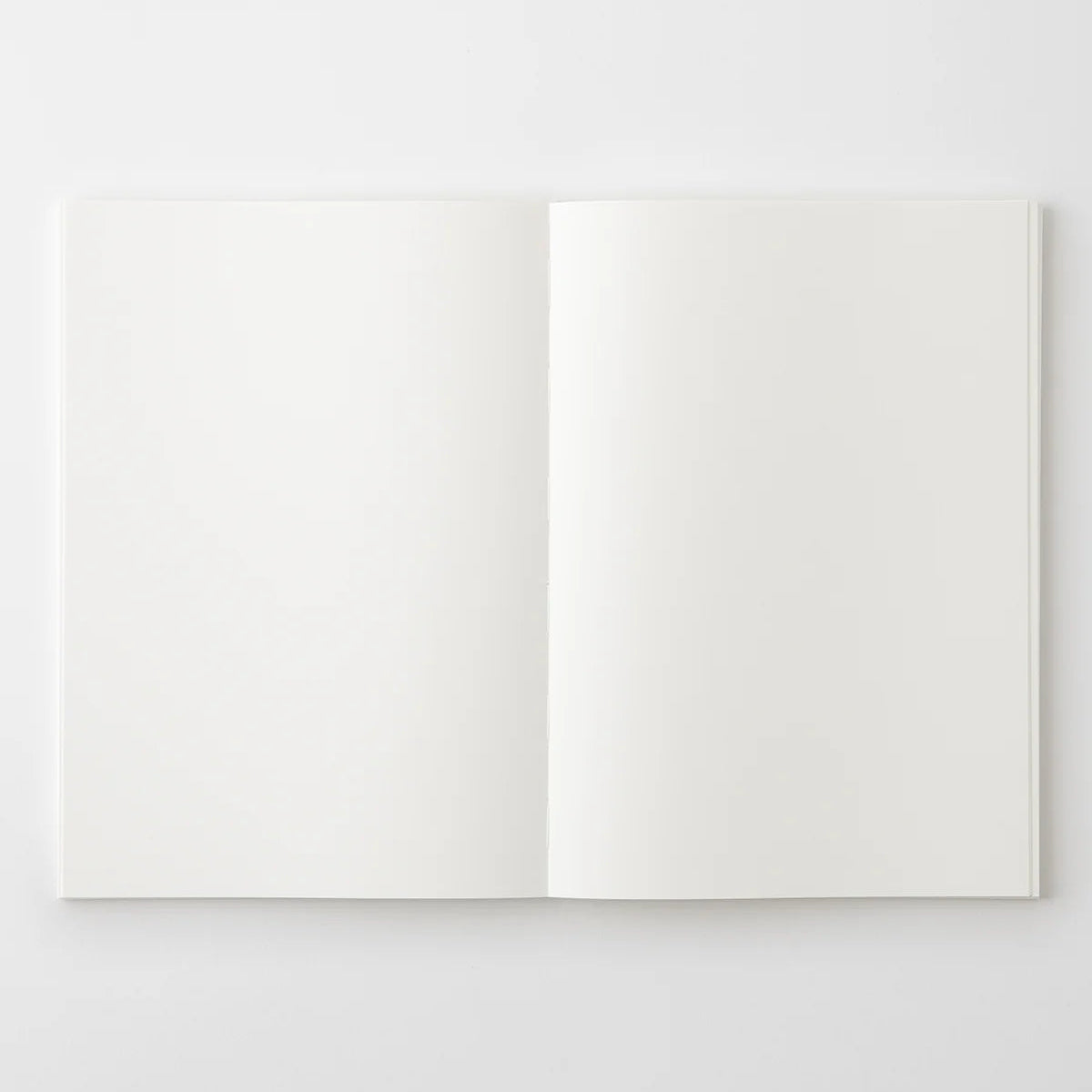 Crafted in Japan, this minimalist notebook is designed to enhance your writing experience. Inside, you'll find the high-quality Midori Diary (MD) paper, first developed in 1960 and refined ever since. Midori has rigorously tested this paper with various writing instruments to ensure quality, checking for ink feathering or bleeding, drying time, the smoothness of pen tips on the surface, and the tactile feel. The result is a paper that resists bleeding and feathering and is fountain-pen friendly, ensuring a