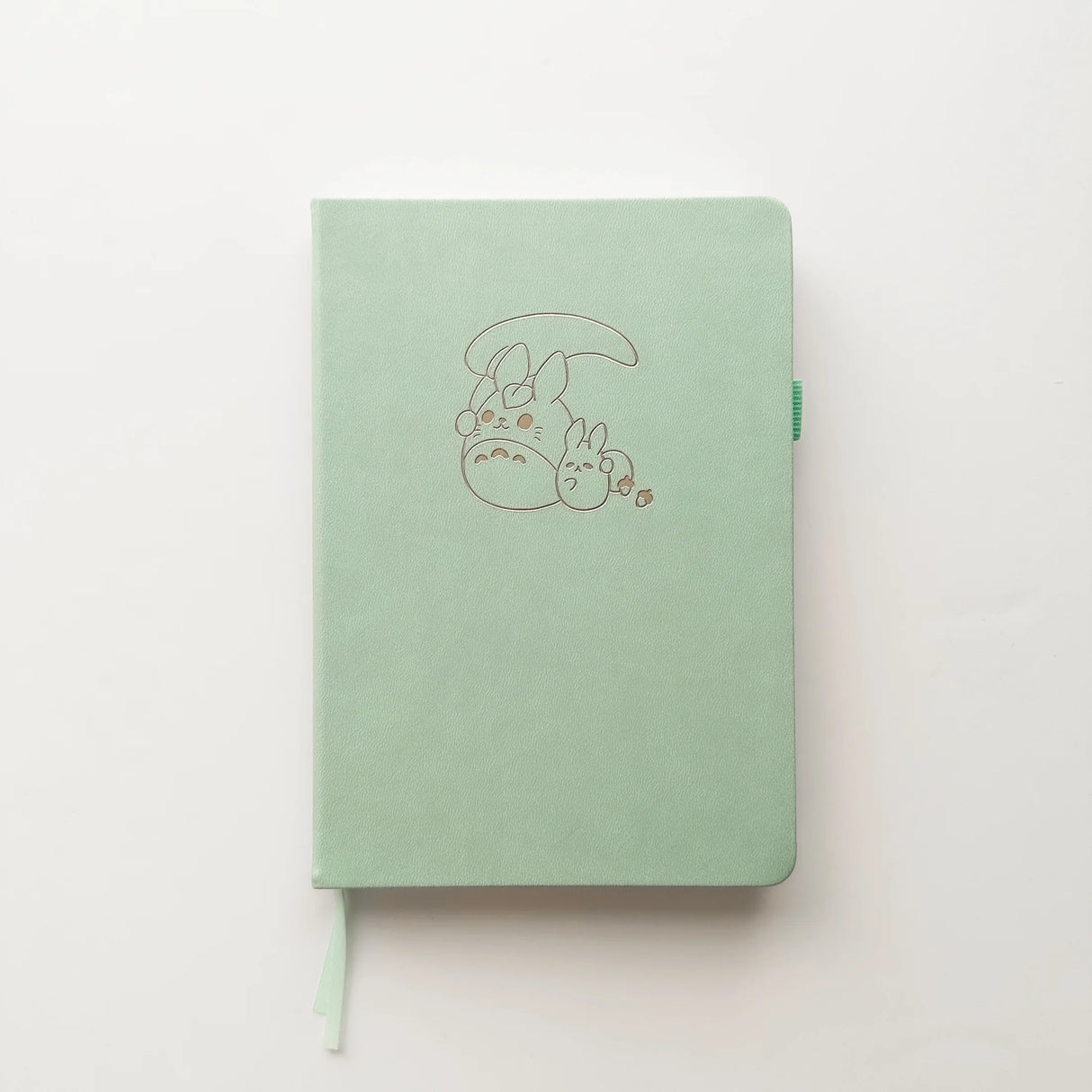 Bunny Spirit Journal in Sage Green with Gold Foil Logo🌱
Product Details:
Size: A5 (5.70 x 8.26 inches)
160 Dotted Grid Pages (5 x 5 mm)
2 Bookmarks
Elastic Band and Pen Holder
Expandable storage compartment