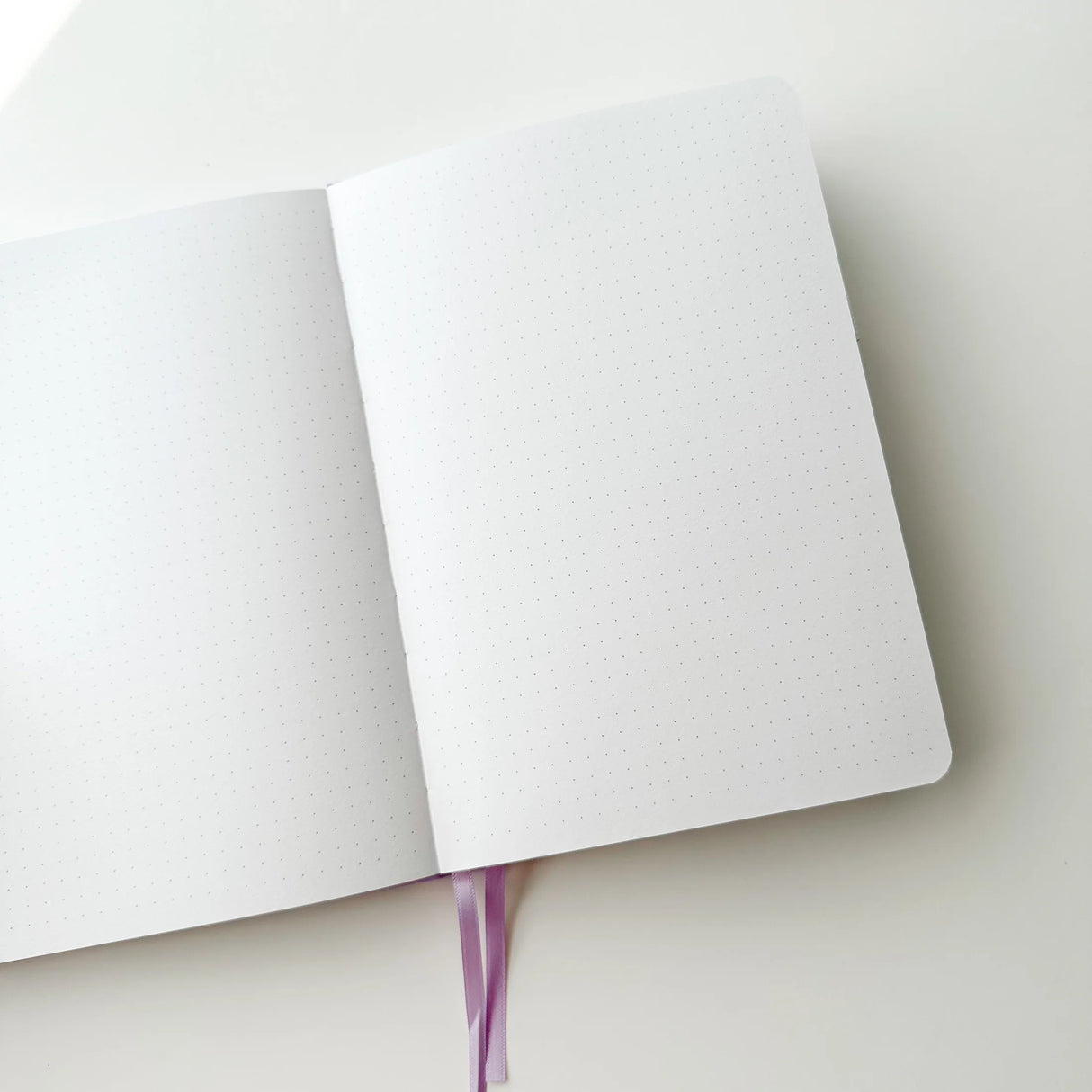 Soft pastel vegan leather bullet journal with delicate gold foil details, made to make your everyday planning feel a little more special ✨
Product Details:
Size: A5 (5.70 x 8.26 inches)
160 Dotted Grid Pages (5 x 5 mm)
2 Bookmarks
Elastic Band and Pen Holder
Expandable storage compartment