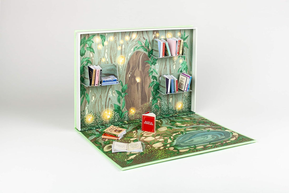 Open the box to go on an adventure into Fairyland and create a library of magical miniature books that you can really read!
Just cut, fold, and stick to make 20 tiny fairy books, from guides to Fairyland and its inhabitants to illustrated stories and books to complete yourself. The kit comes with tiny shelves to store your books and the box becomes a magical fairy playset!
With stunning illustrations from Daniela Jaglenka Terrazzini, this is an enchanting follow-up to 2017's My Miniature Library, lauded