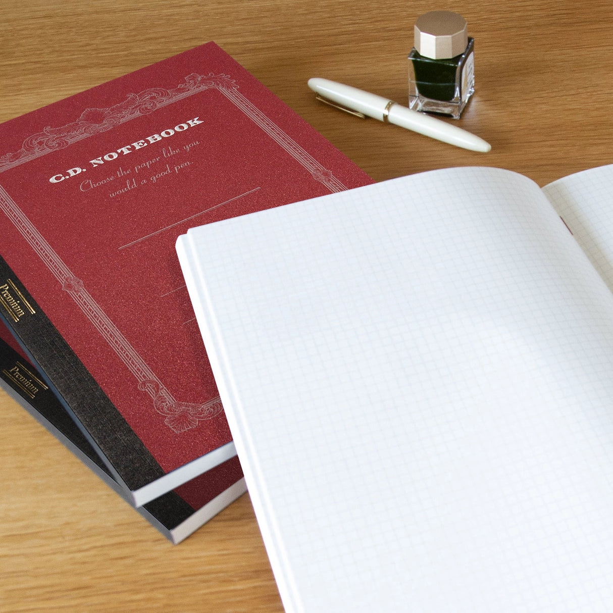 High-quality notebooks are ideal for jotting down ideas, taking notes, sketching, making lists and more. They are perfect for use at home or the office.
Contains silky white, acid free paper that allows for effortless writing.
Notebooks available in ruled, grid and plain paper options.
Heavy duty covers feature a glitter accent.
Silver and gold foil text on the cover also decorate this upscale notebook.
Sturdy thread binding allows the notebook to lay flat for comfortable writing.
Red threading matc
