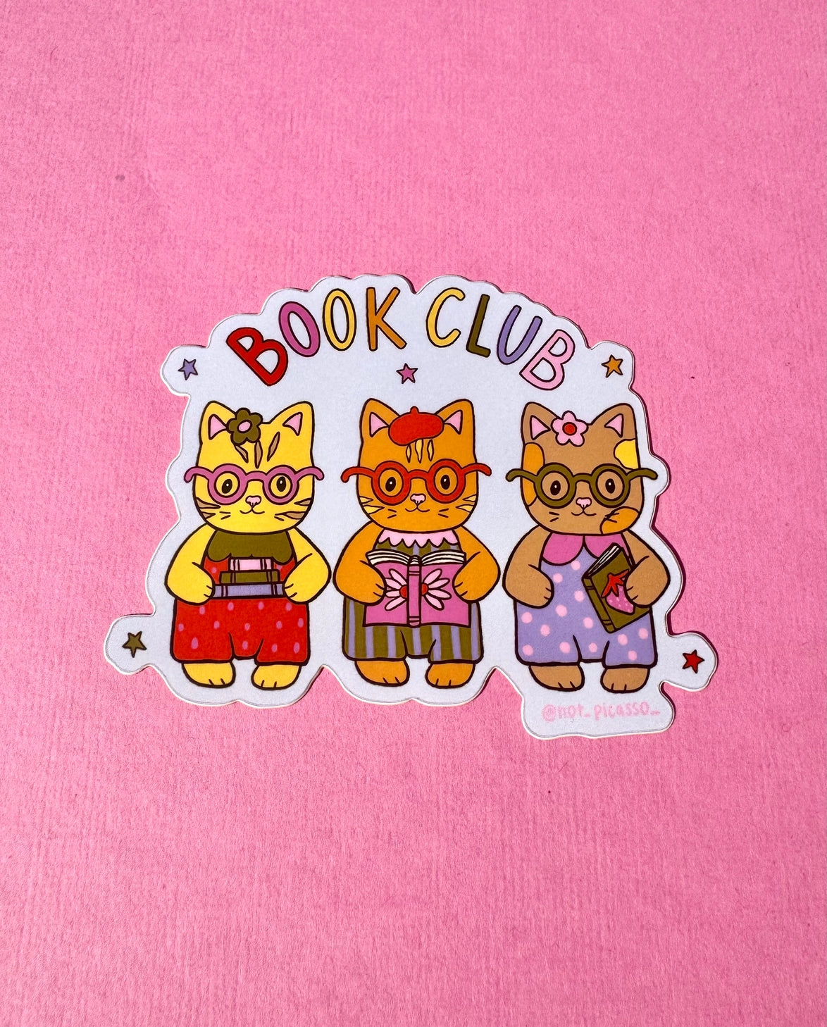 These adorable book themed stickers are perfect for sharing with your book club friends. It features 3 adorable cats with their favorite reads!
These matte vinyl stickers feature an original design and are water, weather, and scratch proof. Perfect for putting on water bottles, computers or just about anywhere else.