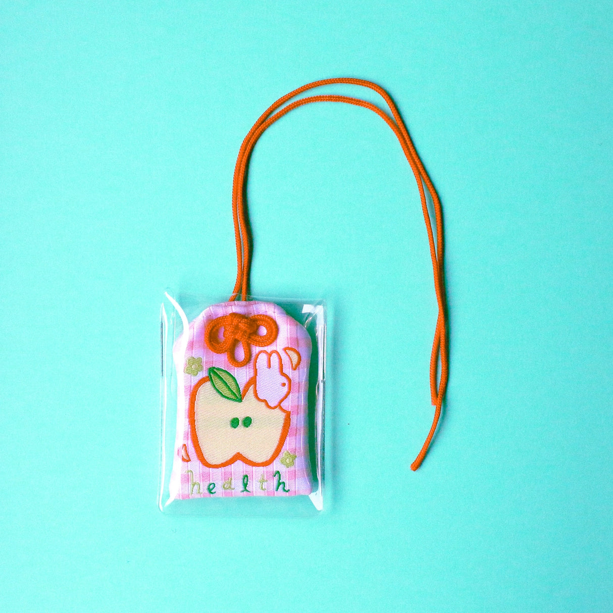2x2.5 omamori charm with a 8 inch string.
An omamori is a Japanese charm that provides protection and luck!