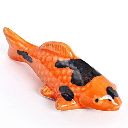 Orange Japanese Koi Fish Rest
These cute ceramic rests are a perfect stationery addition to your desk! Use them for pens, paint brushes, or take them to your kitchen as a chopstick rest!
Size: 2"
Material: Ceramic
Weight:1.6 oz (45.36 g)
Origin: China