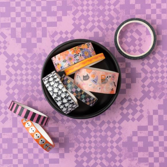 Add a touch of spooktacular charm to your creative projects with the Washi Tape from the Tricks And Treats Collection by Paige Evans for American Crafts.
This package includes eight rolls of tape featuring a variety of designs, such as pink and black stripes, skulls, ghosts, and more.
The rolls range in width from 0.375" to 0.875" and each measures six yards in length, giving you a total of 48 yards of tape to play with.
Whether you're decorating cards, scrapbook pages, envelopes, tags, journals, planner