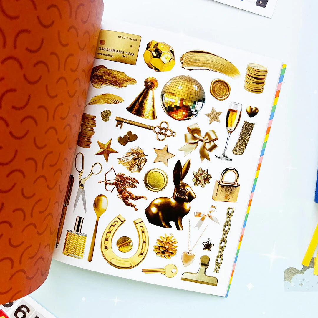 Your sticker stash is about to get very color-coordinated 🌈 Sticker the Rainbow Book Vol. 2: In Real Life is packed with 1500+ photorealistic stickers in every shade imaginable, from juicy lemons and shiny silver treasures to butterflies, vintage objects, florals, gems, and colorful everyday finds. With 30 pages of ultra-realistic stickers (plus 4 pages of alphabet + number stickers!), this book is basically a rainbow treasure hunt for your journal, planner, snail mail, laptop, or craft cart.