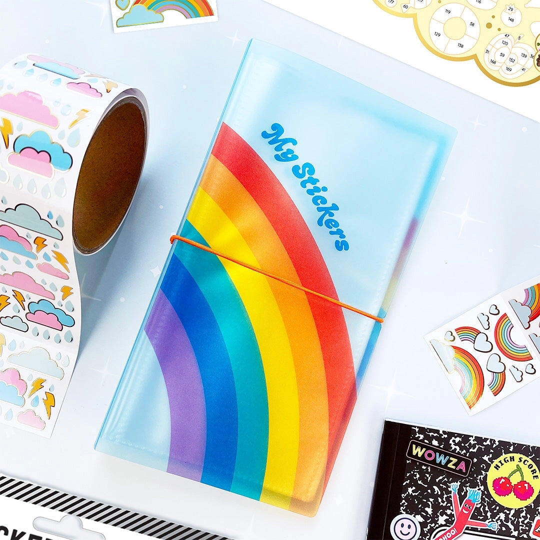 This rainbow-bright Pocket Sticker Keeper is made to stash, sort, and show off your fave sheets. With clear pockets inside and a snug elastic closure, it keeps your collection neat, protected, and ready to grab on the go. Toss it in your tote, bring it to school, or keep it by your desk — your stickers just found their forever spot. 💛
Inside pockets are made to display the 4" x 4" Pipsticker sheets and can hold at least 80 sticker sheets! 
