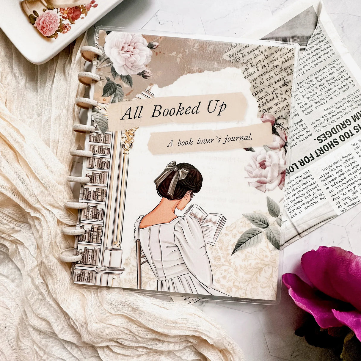 Dive into your next book with the All Booked Up Reading Journal by your side, the ultimate companion for book lovers where aesthetic meets functionality.
Whether you're flipping through the latest thriller or getting lost in a historical fiction, our journal is here to make every page turn count. With easy-to-use sections like a Book List, Your Thoughts, Reading Goals, and Space for Ideas, this journal is everything a reader needs.
Never Lose Track of a Book Again: Forget about trying to remember that boo