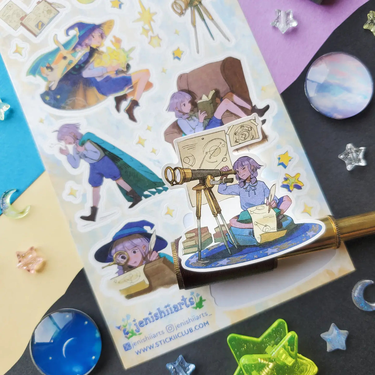 💫🔠We gotta introduce you to Stella! @jenishiiarts_’s adventurous star-chasing witch with a mission to return fallen stars to the sky! I mean, what’s cooler than that? When she’s not busy studying the celestial lights, face buried in a book or peering through her telescope, you can find her soaring through the cosmos, hopping from star to star. Cheer her on with this amazing sticker sheet and postcard set! Art by: @jenishiiarts_
Top Coating: None
Adhesive Layer: Paper
Backing Layer: Paper
6.69" x 3.54".