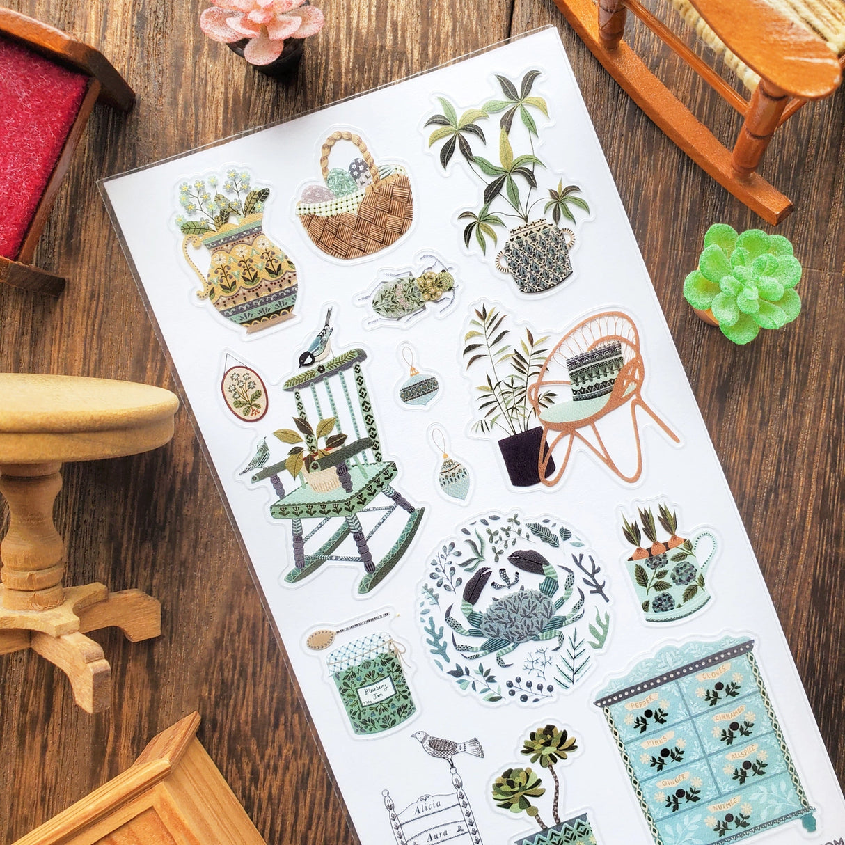 STICKII Serene Botanical Home Sticker Sheet
🪴🪑 In a quaint cottage by the sea, rocking chairs wait by sunny windows, painted pots overflow with plant life, and a spice cabinet murmurs its secrets. With gorgeous details and soft blue hues, @aliciauraa’s designs take us to a serene home where every object holds a story.