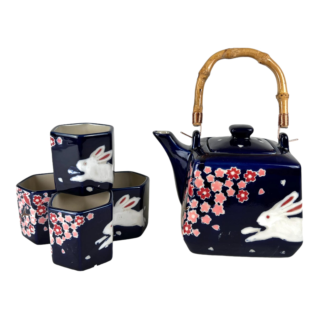 Sakura Cherry Blossoms Rabbit Tea Set Tea Pot with 4 Hexagon Cups
Capacity: 20 fl oz
Teapot comes with stainless steel strainer
Material: Porcelain
Origin: China