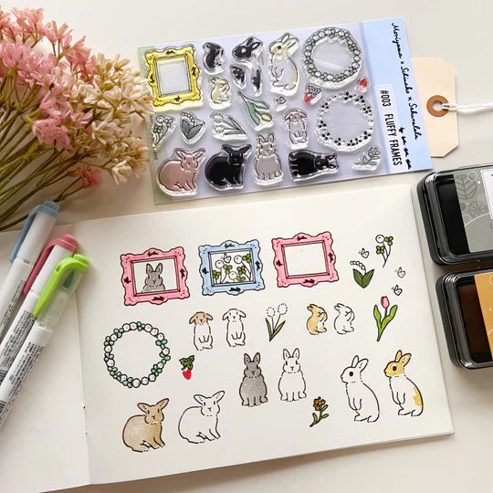 This collaboration with Moriyama, who has a wonderful shop in Ota Ward, Tokyo, and Shiko Moriyama, an illustrator who draws adorable rabbits.
"Fluffy Frames" is a clear stamp with cute frames that can be used in a notebook. Rabbit's stamps are divided into base outline stamps and coloring stamps that serve as patterns. You can stamp it in any color you like, so if you have a rabbit in your family, please try stamping it in the color of "my child"!