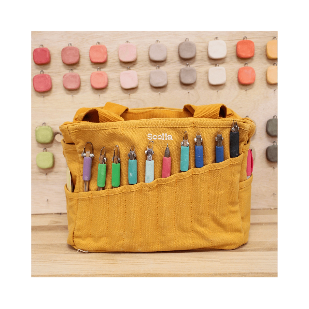 Your art is bold. Your bag should be too. The world's most loved art supply bag, pottery tool bag & knitting project bag – backed by over 10,000 global artists!
✌️ 15 stunning colors ✌️
🌈 Over 30 Pockets Of Varying Sizes
🌈 Slanted Skinny Pockets : For your most-loved tools that beg for your attention (carving tools, knitting needles, crochet hooks
🌈 Large Interior Storage + 2 interior pockets: Perfect for carrying glazes, knitting yarn, crochet supplies, and craft supplies
🌈 Phone & Wa