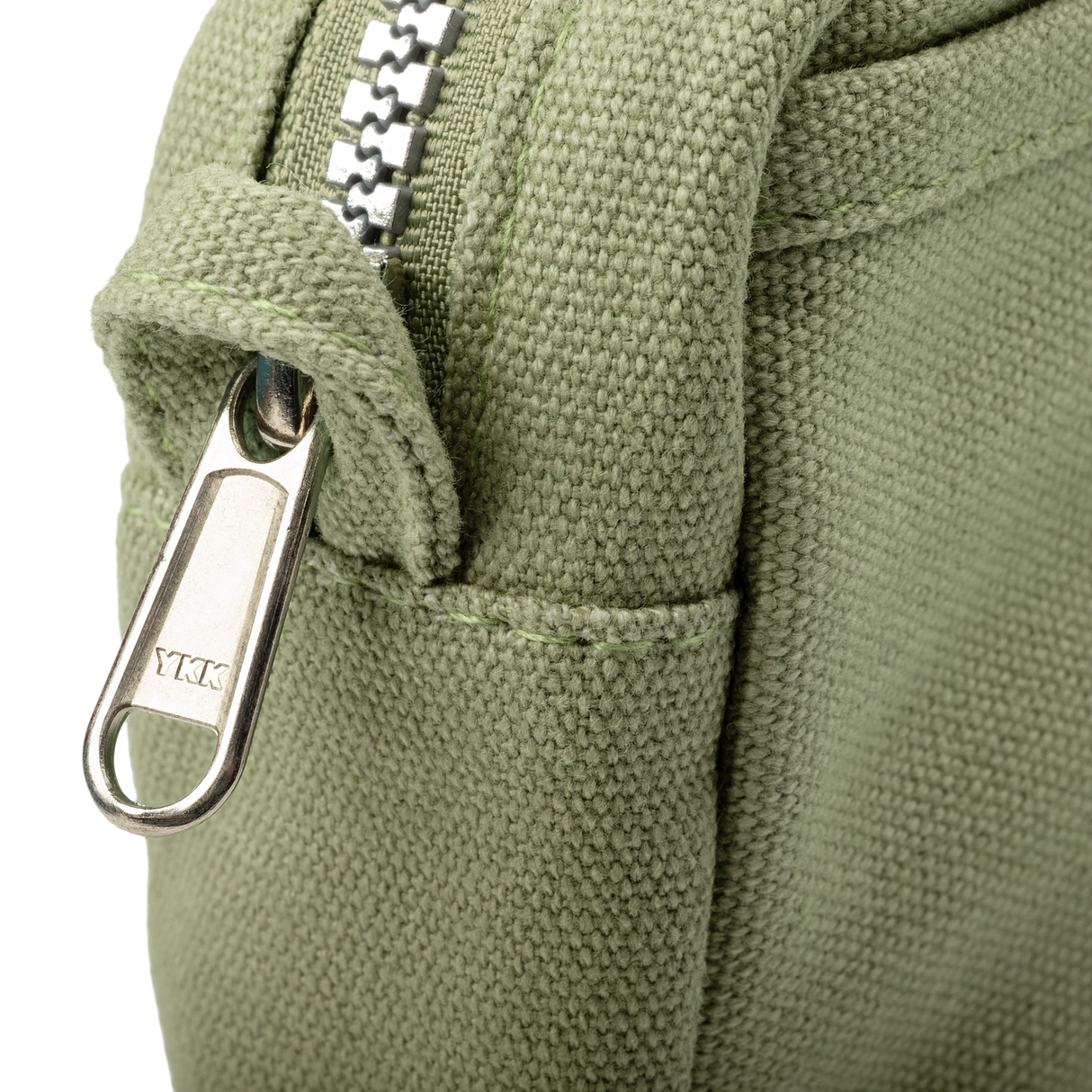Features & Specs
Front layout: 8 slanted pockets + 3 directly behind
Interior: Main compartment fits an A5 notebook; two open compartments on each wall
Back panel: 3 wide exterior pockets + one full-length slip pocket
Quick-drying duck canvas — sturdy, breathable, and machine-washable
Convertible design — hooks for your own strap or a Soolla strap (coming soon)
Structured silhouette — holds its shape even when lightly packed
Full-width YKK zipper — smooth and durable
Compact profile — fits